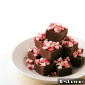 Foolproof Microwave Fudge, topped with festive peppermint crunch