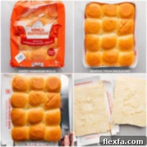A block of Hawaiian rolls being carefully sliced in half horizontally with a serrated knife.