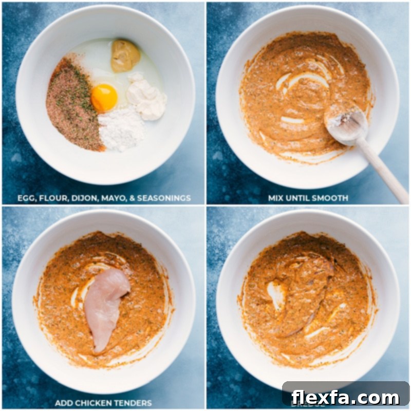 Raw chicken tenders being coated in a creamy batter in a bowl, showcasing the preparation step for breading.