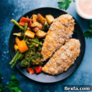 Baked Parmesan Chicken Tenders on a plate.