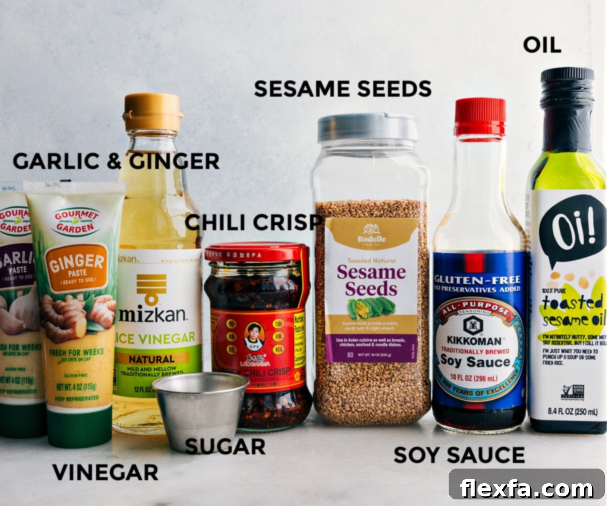 All the essential ingredients for the Smashed Cucumber Salad dressing, neatly prepped and laid out for easy assembly.