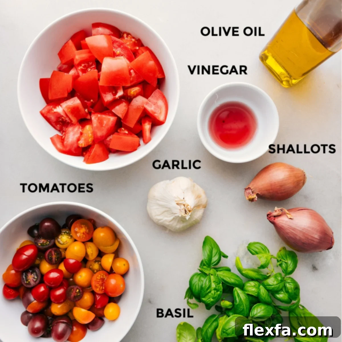 All the vibrant, fresh ingredients for the tomato salad, including a mix of colorful cherry tomatoes, larger vine-ripened tomatoes, aromatic basil, finely chopped shallots, and minced garlic, neatly prepped and laid out for easy assembly.