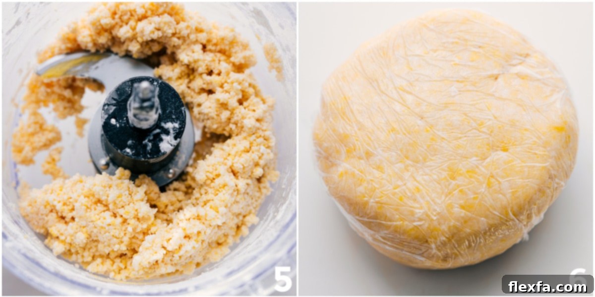 Thick, pliable pie dough, freshly rolled out from the food processor onto plastic wrap, perfectly chilled and ready to be pressed into the pie pan for a simple and fool-proof pie crust recipe.