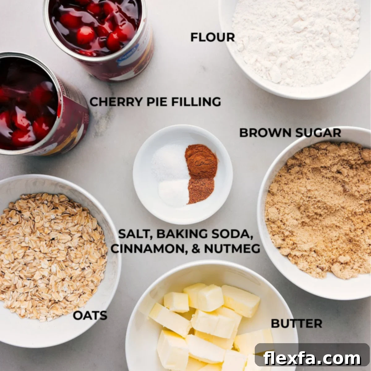 Ingredients used for the dessert, featuring cherries, oats, sugar, and more.