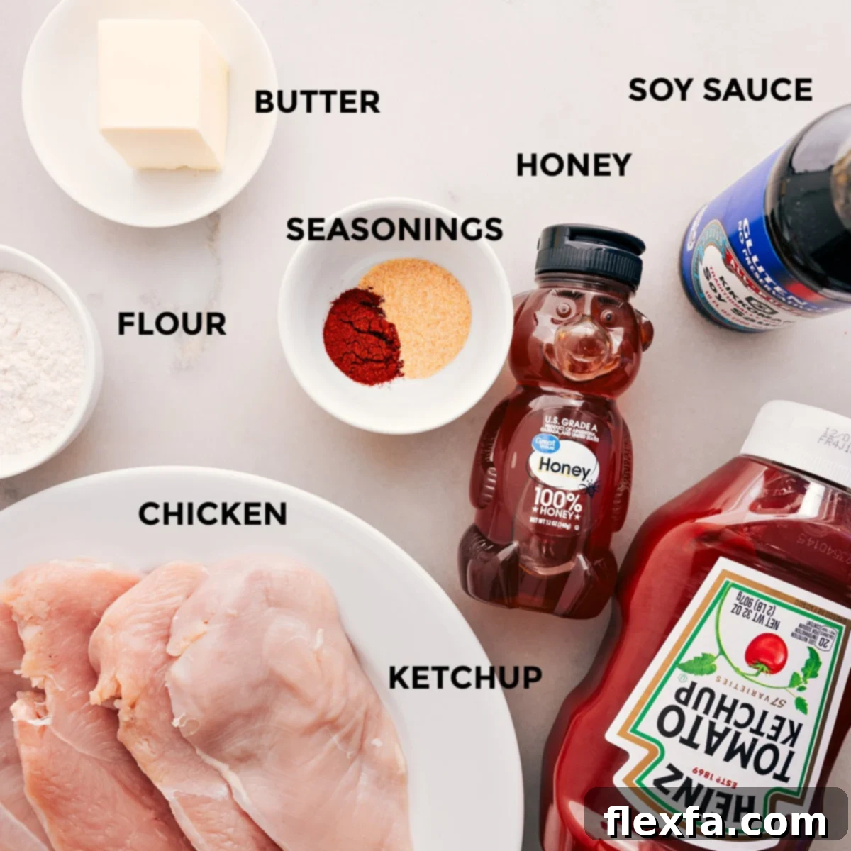 Ingredients In Honey Garlic Chicken Recipe All the ingredients for this recipe are prepped and ready for easy assembly: butter, soy sauce, honey, seasonings, ketchup, meat, and flour.