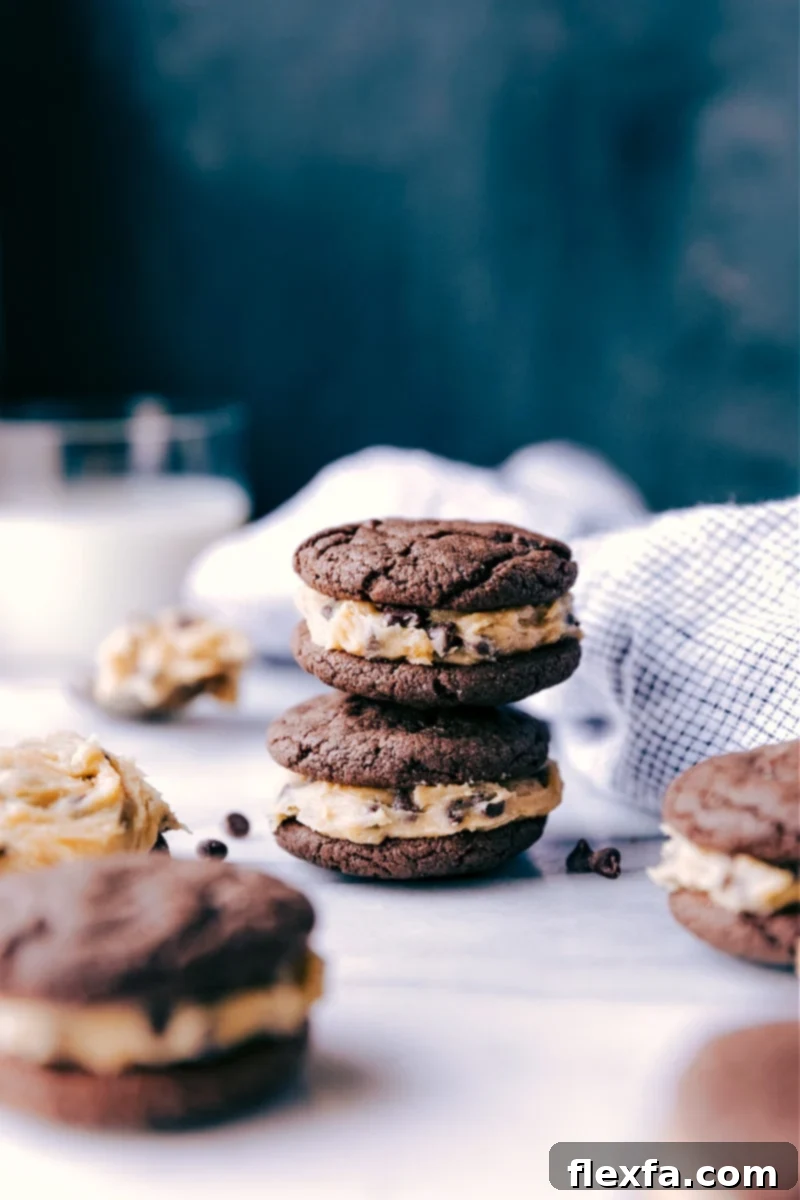 Homemade Cookie Dough Oreos stacked high, showcasing their thick, creamy filling.