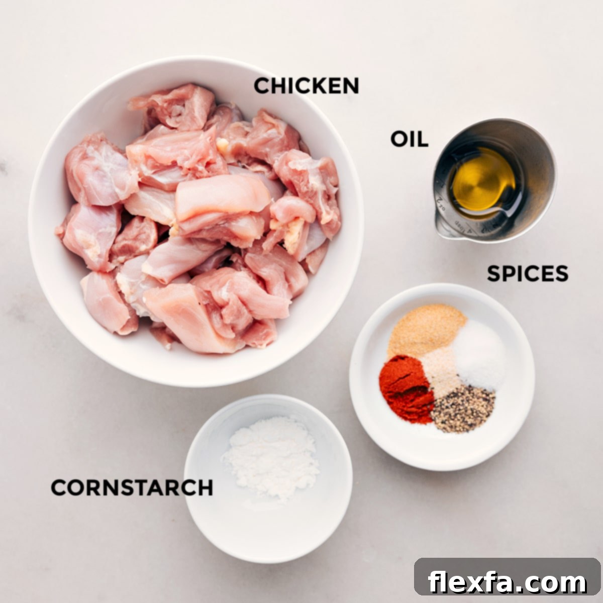 The meat is prepped with spices, oil, and cornstarch to make the recipe.