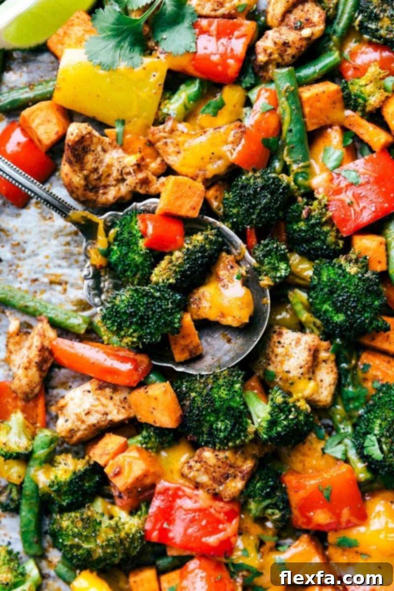 Close-up of a second image showing the One-Pan Healthy Chicken and Veggies meal, highlighting the perfectly roasted texture and colorful medley of ingredients, ideal for weekly meal planning.
