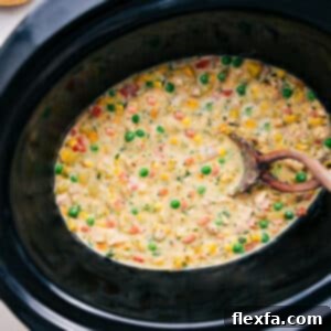 A close-up shot of the finished Crockpot Chicken Pot Pie, showcasing its creamy texture, tender chicken, and vibrant vegetables, ready to be served.