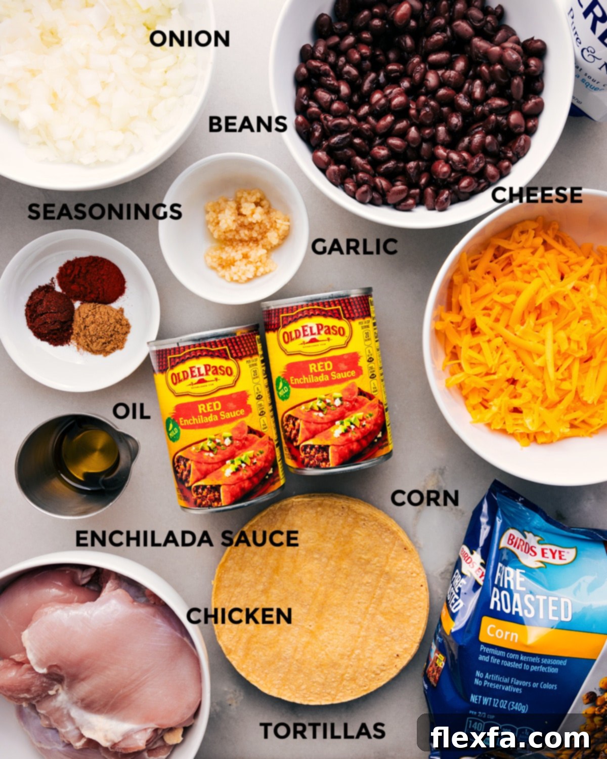 Key Ingredients for Easy Crockpot Chicken Enchilada Casserole A vibrant display of all the essential ingredients for Crockpot Chicken Enchilada Casserole, including chicken, enchilada sauce, corn tortillas, black beans, frozen corn, cheese, and various seasonings, ready for assembly.