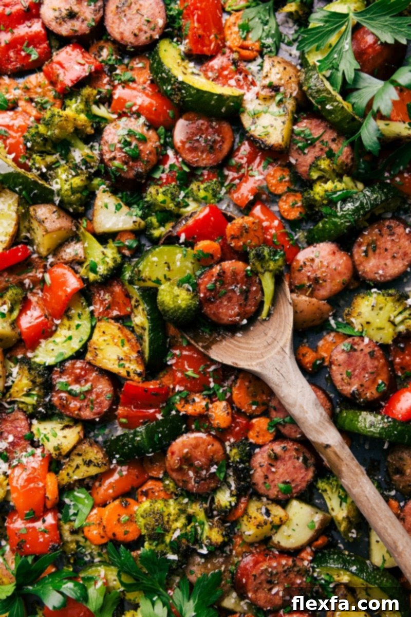 One-Pan Italian Sausage and Veggies A tray featuring the perfectly cooked and seasoned one pan Italian sausage and veggies recipe, where all the flavors come together to create the perfect combination of flavor and texture.