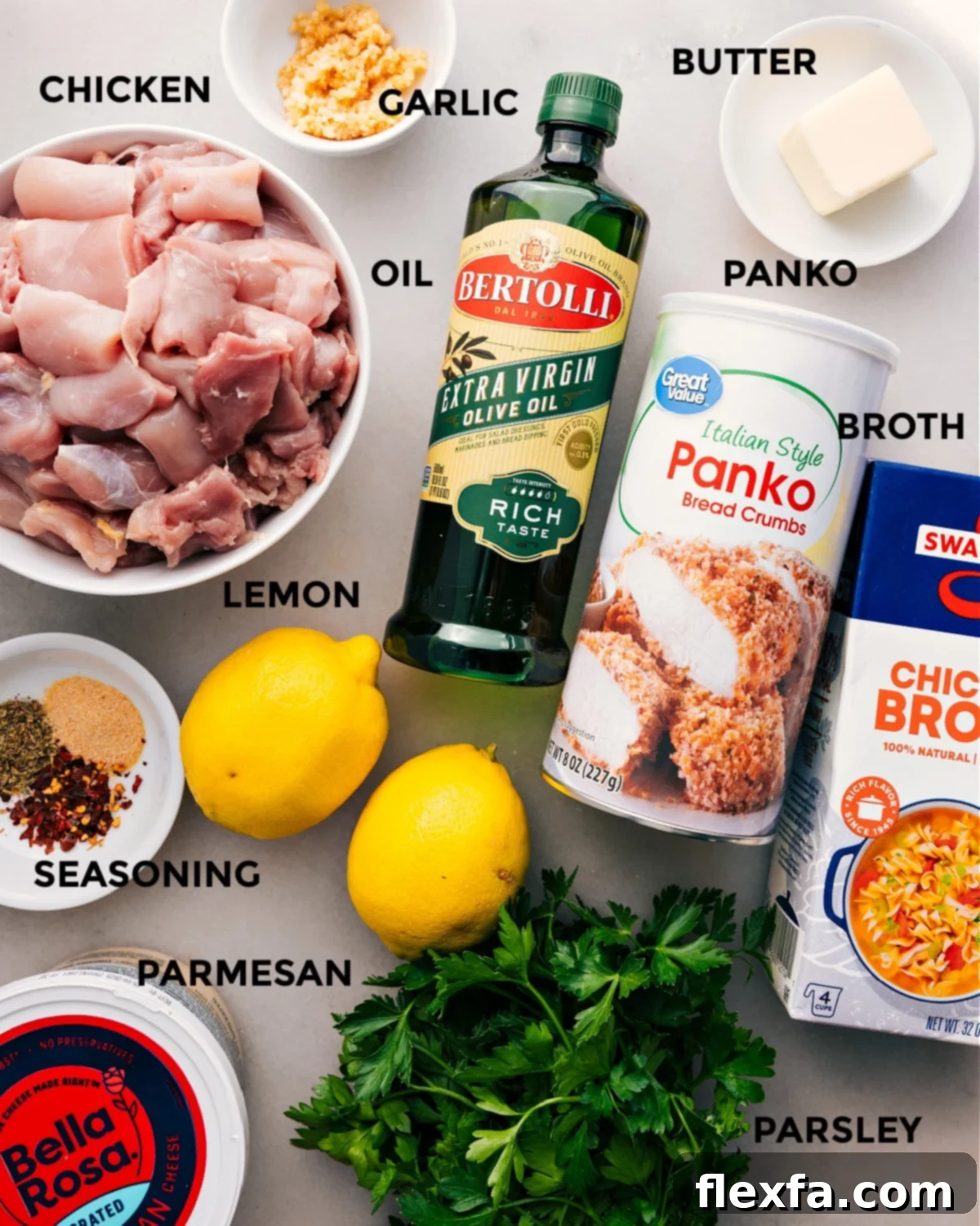 All the ingredients are prepped for easy assembly—meat, oil, panko, butter, garlic, broth, lemon, seasoning, parmesan, and parsley.