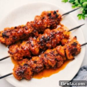 A small square image of the finished Hot Honey Chicken skewers, ready to be served.