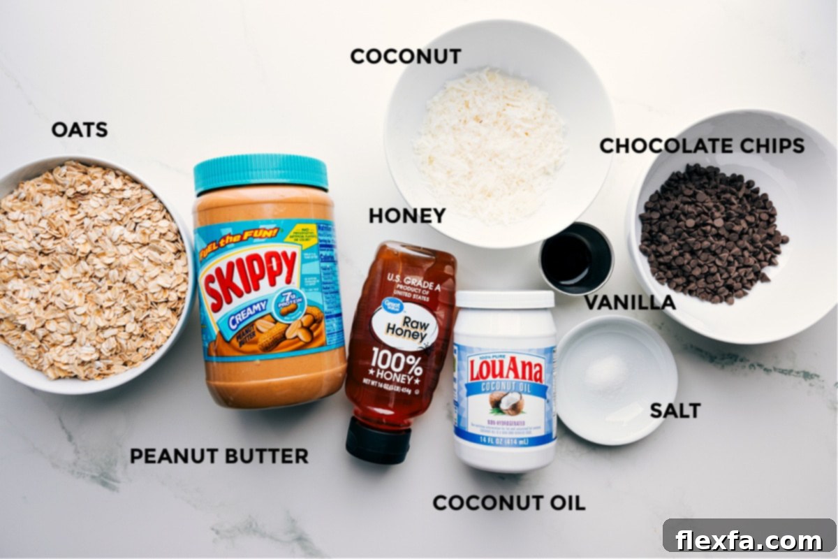Ingredients In Peanut Butter Granola Recipe Prepped ingredients for Homemade Peanut Butter Granola, including rolled oats, creamy peanut butter, honey, melted coconut oil, vanilla extract, cinnamon, and optional chocolate chips or coconut flakes ready for mixing.