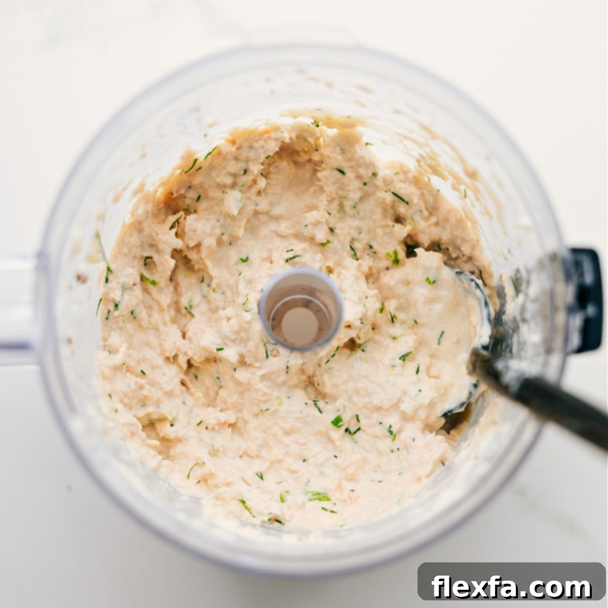 How To Make The Viral Tunacado All the ingredients for the tuna mix, including drained tuna, mayonnaise, lemon juice, green onions, and fresh dill, are blended together in a small food processor to create the creamy, herby tunacado filling.