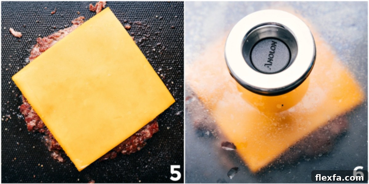 Cheesy And Flavorful Smashburger Recipe The cheese being placed on the smashburger recipe and the cheese melting onto it.
