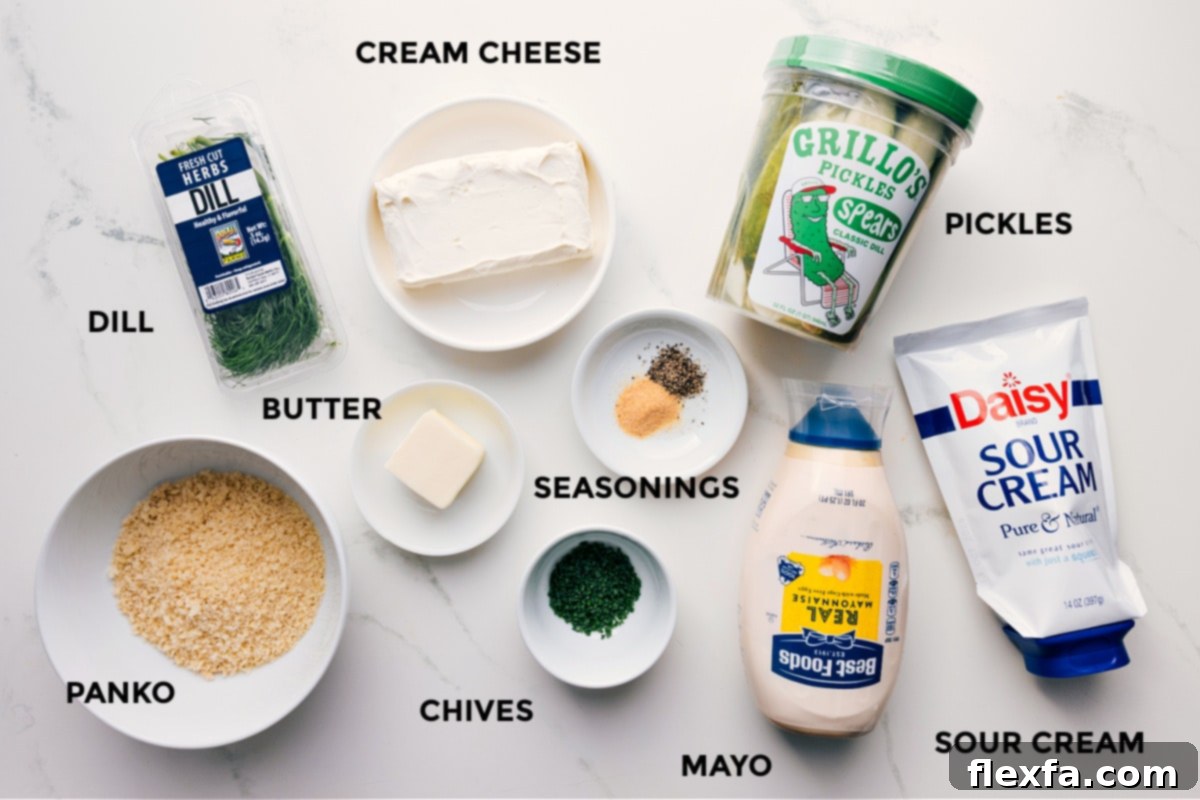 All the fresh ingredients neatly prepped for easy assembly: finely chopped dill, fresh chives, softened cream cheese, sour cream, mayonnaise, various seasonings, diced dill pickles, and golden-brown panko breadcrumbs with butter.