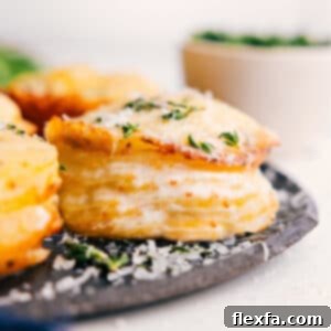 Finished Potato Stacks Recipe, golden and topped with fresh thyme