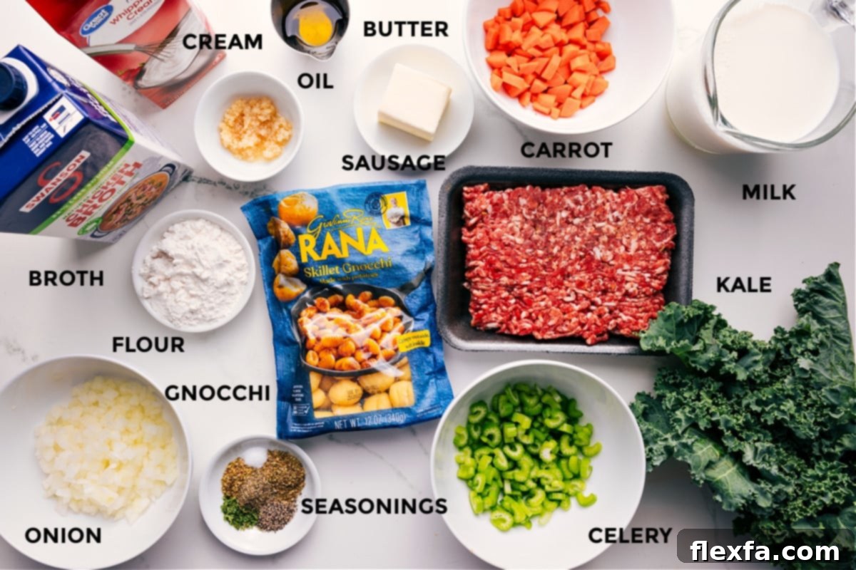 All the fresh ingredients for Sausage Gnocchi Soup, neatly prepped: broth, cream, flour, onion, gnocchi, seasonings, celery, kale, milk, carrot, sausage, butter, and olive oil.