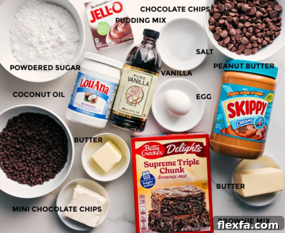 A curated display of all essential ingredients for Buckeye Brownie Cookies, including powdered sugar, coconut oil, chocolate chips, butter, vanilla extract, pudding mix, creamy peanut butter, egg, and a brownie mix, neatly prepped for baking.