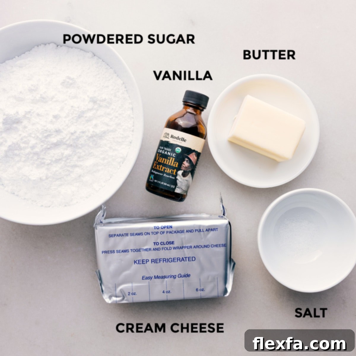 The smooth and creamy frosting layer, ready to be spread over the cooled cookie crust for this fruit pizza recipe.