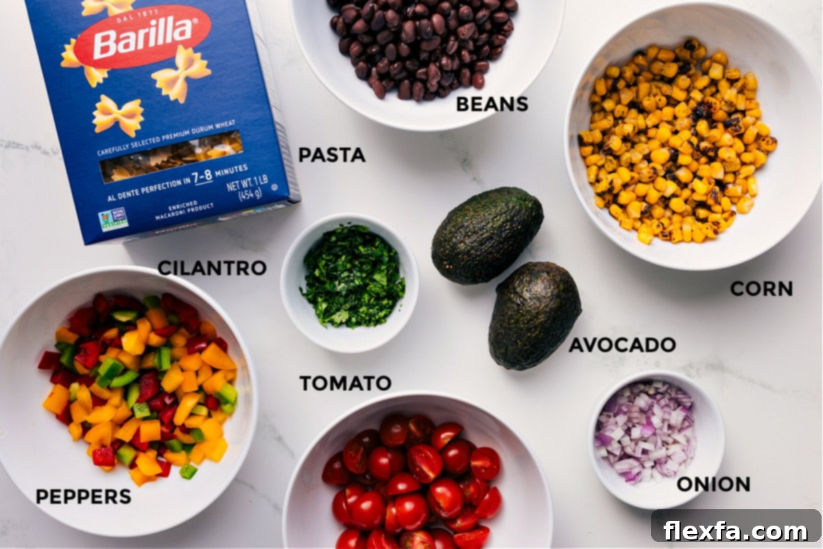 Key Ingredients for a Delicious & Authentic Mexican Pasta Salad All the fresh ingredients for Mexican Pasta Salad meticulously prepped and laid out for easy assembly: black beans, mini bowtie pasta, grilled corn kernels, diced avocado, finely chopped red onion, halved cherry tomatoes, fresh cilantro, and a colorful array of diced bell peppers.