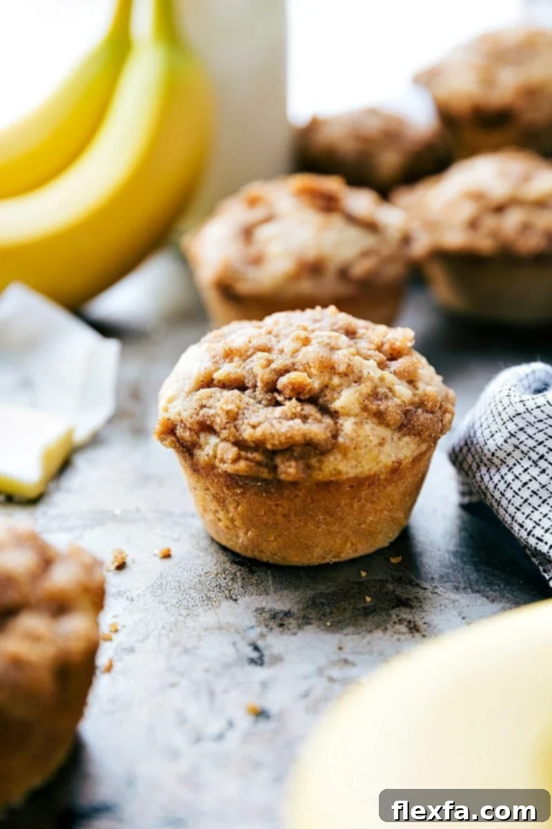 Scrumptious Banana Crumb Muffins with Irresistible Topping Banana crumb muffins with a delicious crumble topping, baked to perfection.