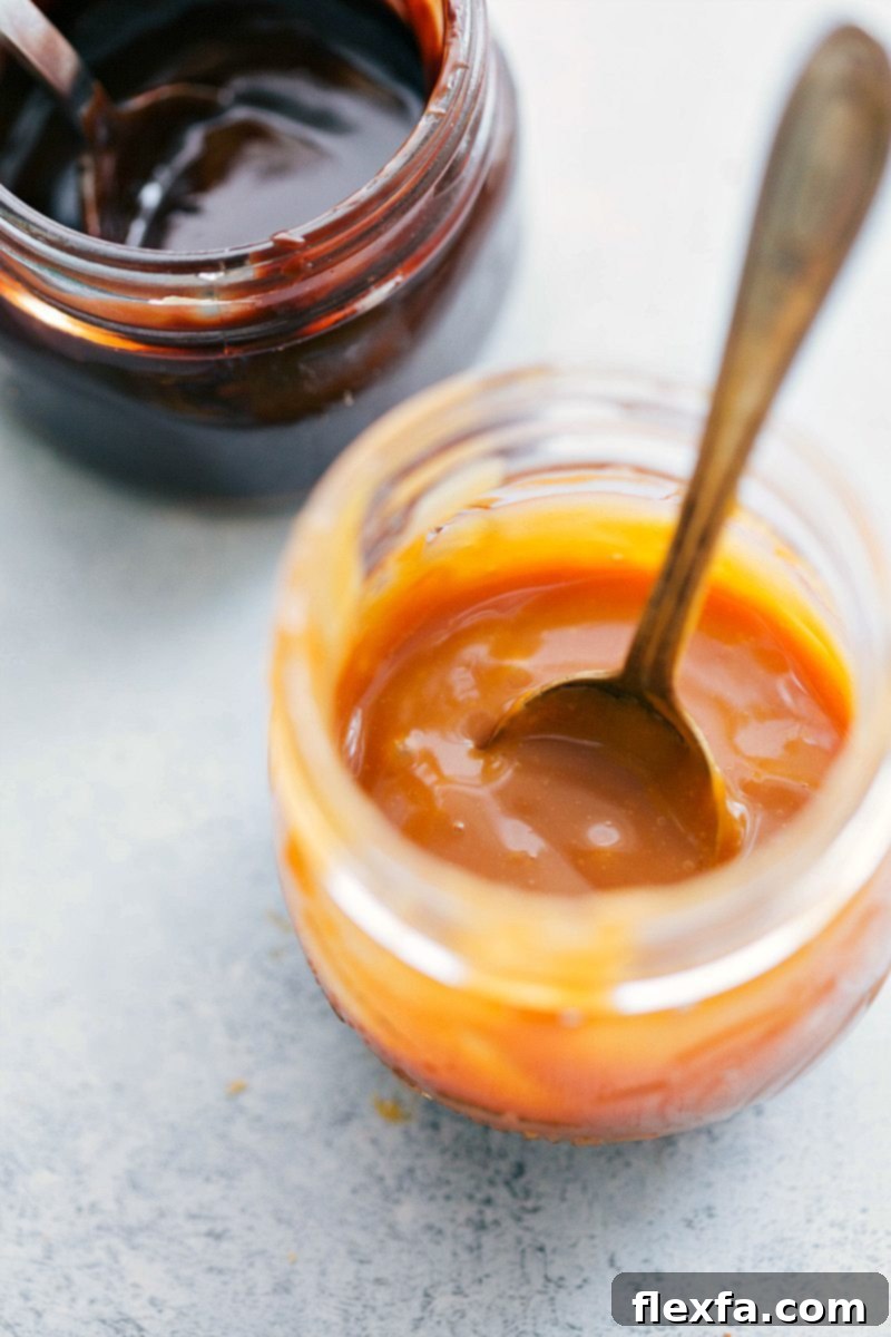 Homemade caramel sauce and chocolate ganache drizzled over Twix Cheesecake Bars