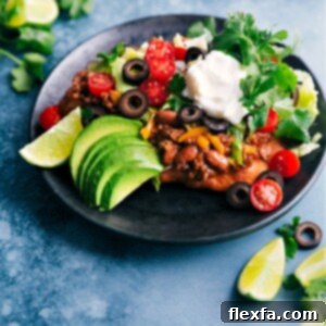 A beautifully plated Navajo Taco, showcasing the golden fry bread and generous toppings.