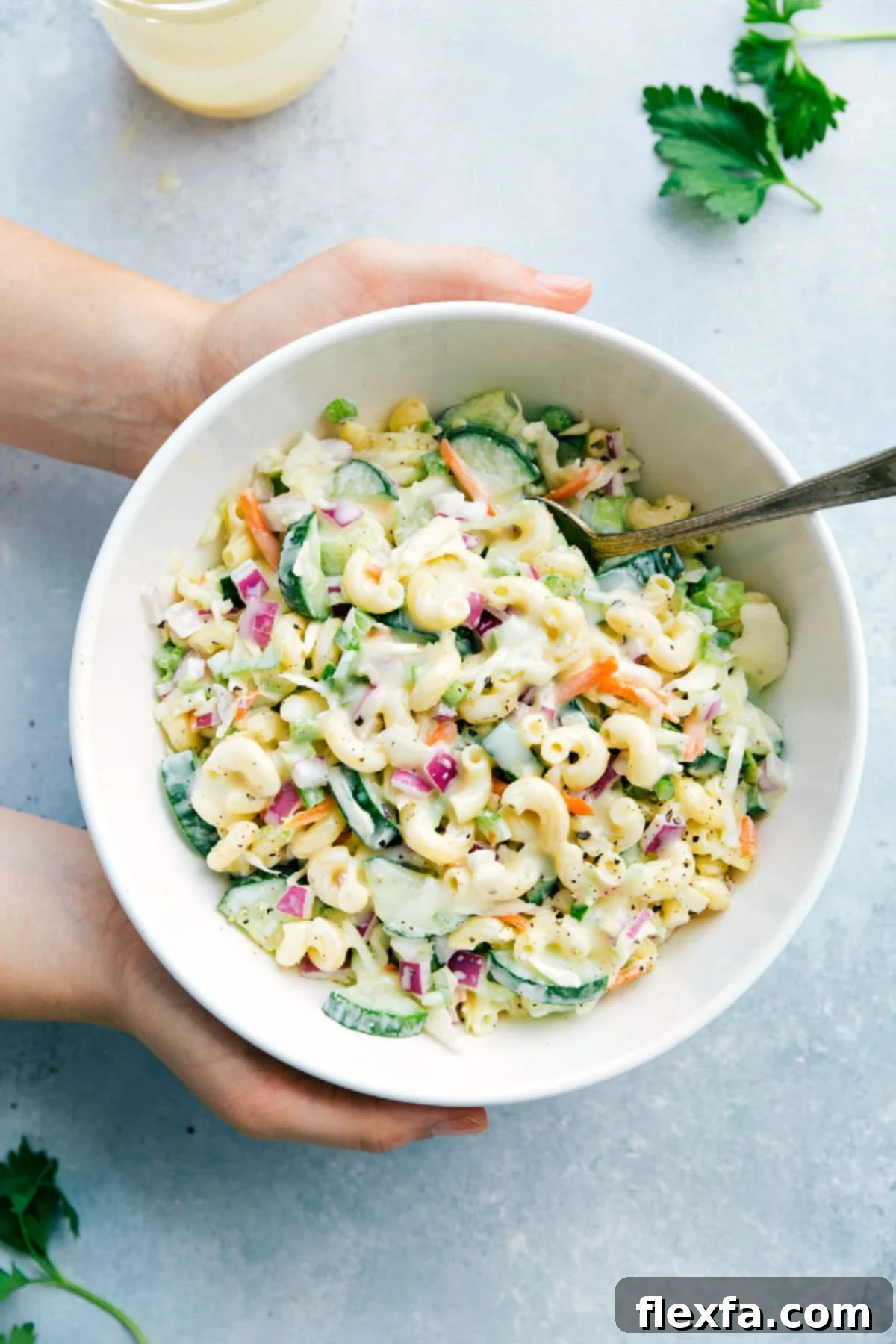 Macaroni Coleslaw Salad recipe in a bowl, a perfect summer side dish.
