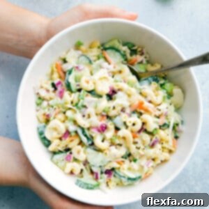 Macaroni Coleslaw Salad in a bowl ready to be enjoyed.