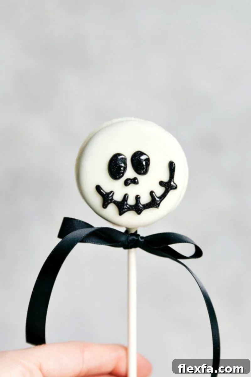 SKELETON OREO POP! Simple Halloween Oreo Pops -- Spider Oreo Pops, Skeleton Oreo Pops, Frankenstein Oreo Pops, and Monster Oreo Pops I chelseasmessyapron.com
