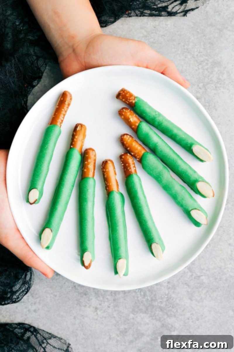 3-ingredients to make these adorable (and delicious) Halloween treats -- Monster Rice Krispies Treats, Peanut Butter Spider Cookies, Nutter Butter Ghosts, and Witch Finger Pretzels. chelseasmessyapron.com