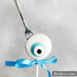 Creepy Eyeball Oreo Pops, a fun and delicious Halloween dessert idea.