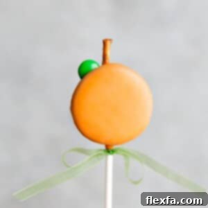 Pumpkin Oreo Pops, a fun and easy Halloween dessert for parties and fall celebrations.