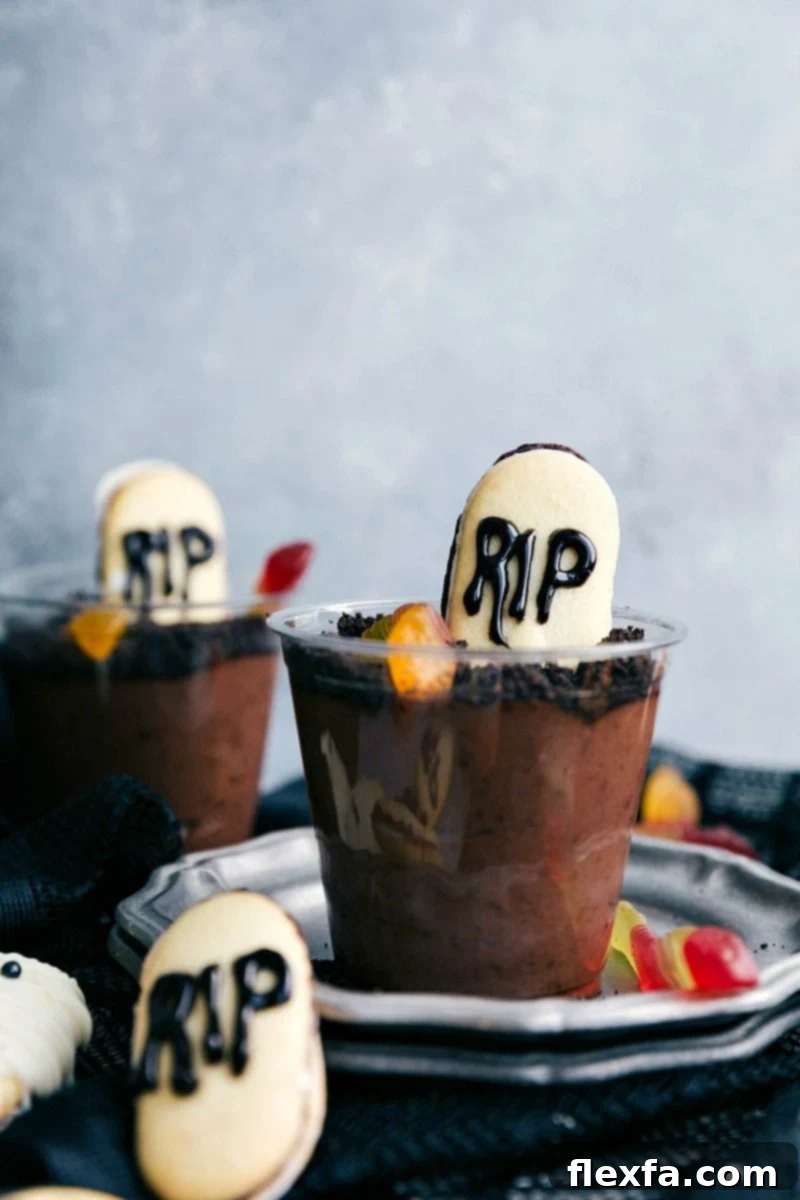 Picture of the graveyard pudding cups that go along with these easy halloween treats
