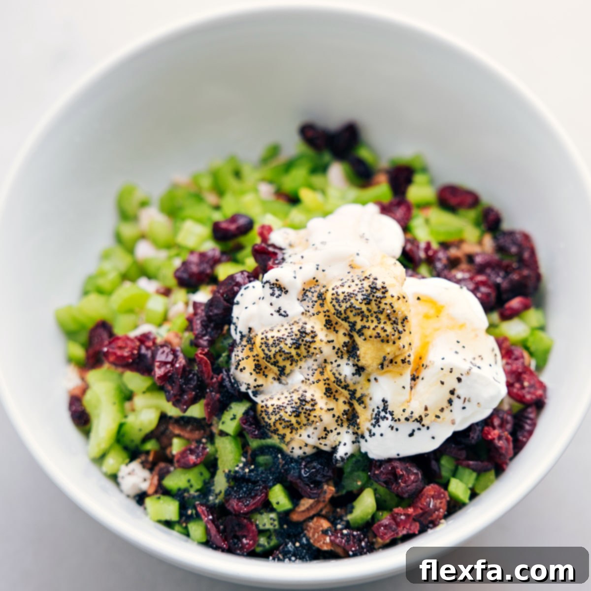 How To Make The Best Chicken Salad All the prepared ingredients for this chicken salad recipe beautifully combined in a large mixing bowl, ready to be enjoyed as a light lunch or delicious appetizer.