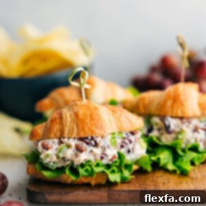 Chicken Salad recipe assembled in a croissant with lettuce.