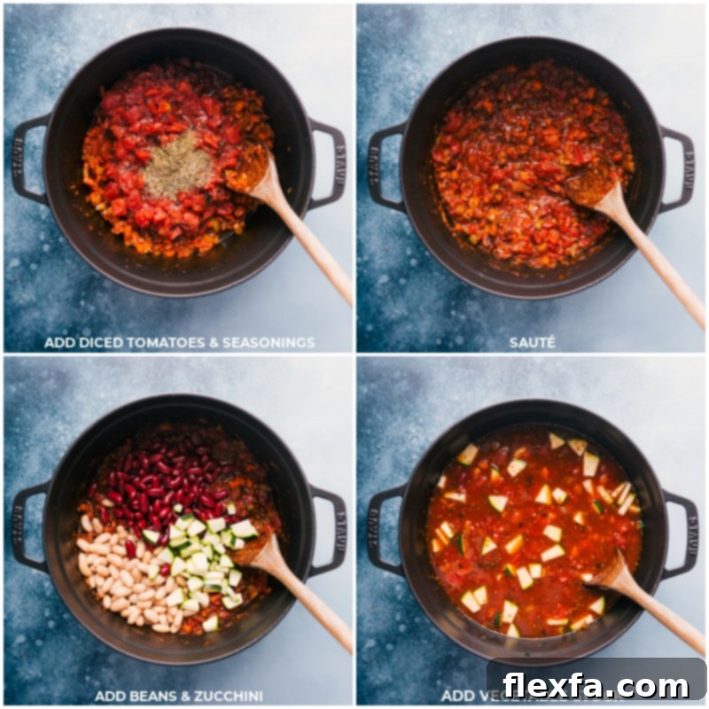 A large pot on the stovetop filled with the simmering Olive Garden Minestrone Soup recipe, showcasing the vibrant diced tomatoes, a mix of seasonings, various beans, zucchini, and vegetable stock melding together to create a fresh and delicious broth.