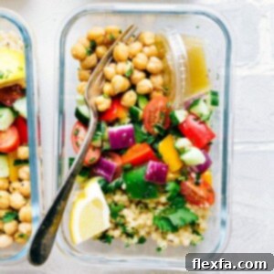 Greek couscous salad in a glass container for lunch.