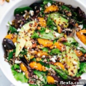 A beautifully presented serving of Citrus Quinoa Salad, showcasing its vibrant colors and fresh ingredients.