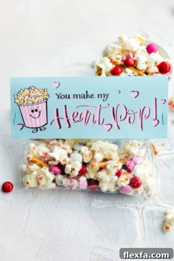 Effortless Valentine's Day Presents 3 Close up of 'You Make My Heart Pop' White Chocolate Popcorn bag with printable topper