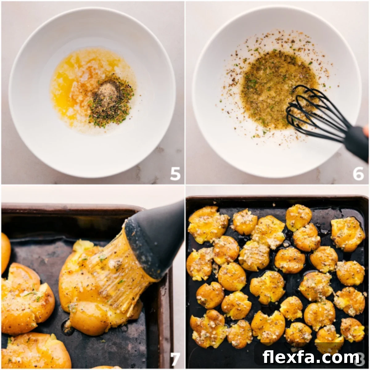 A sheet pan with smashed potatoes being brushed with herb butter before roasting, ensuring a crispy finish.