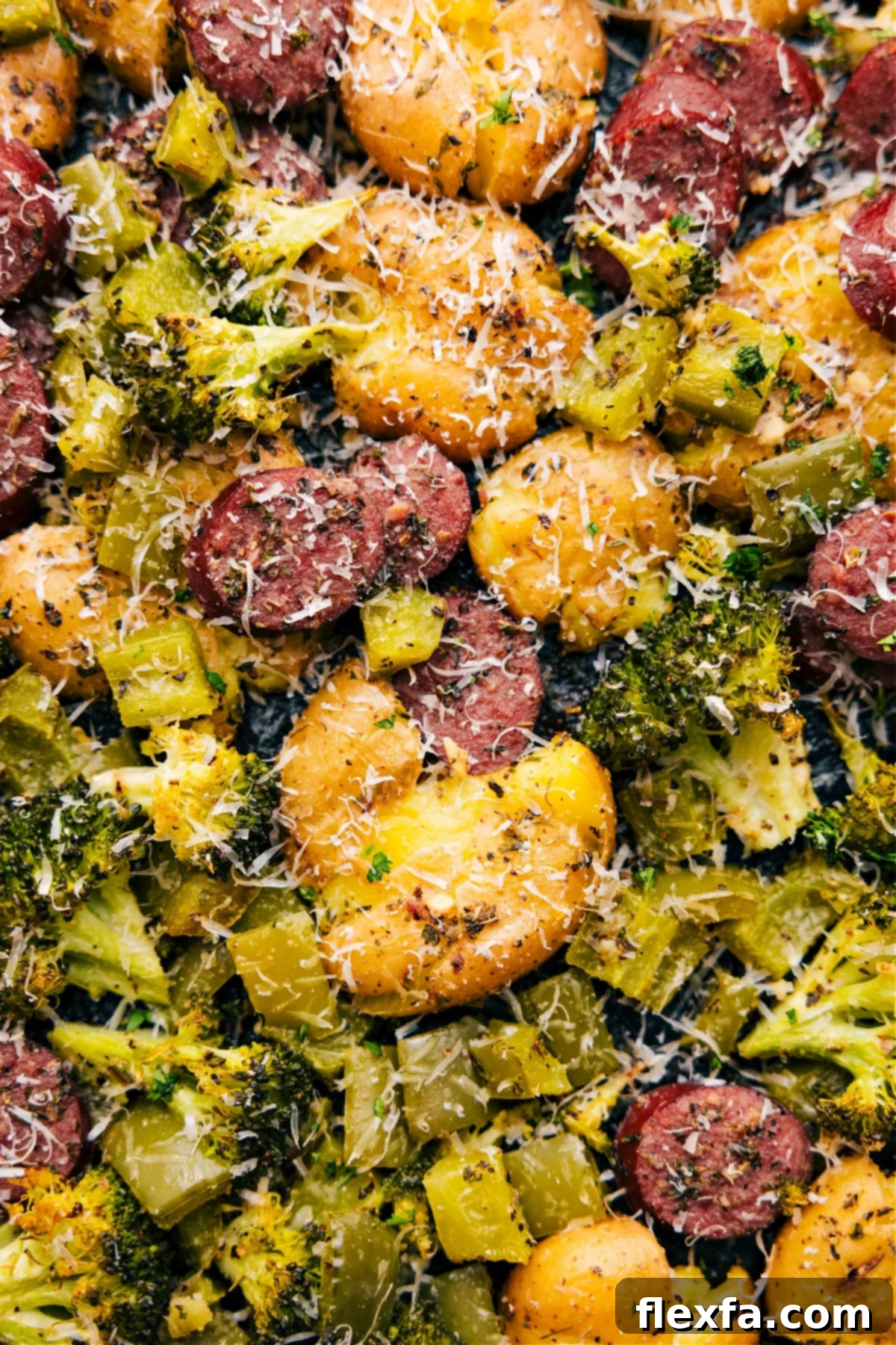A freshly roasted Sausage Potato Broccoli Sheet Pan dinner, perfectly golden and ready to be served from the pan.