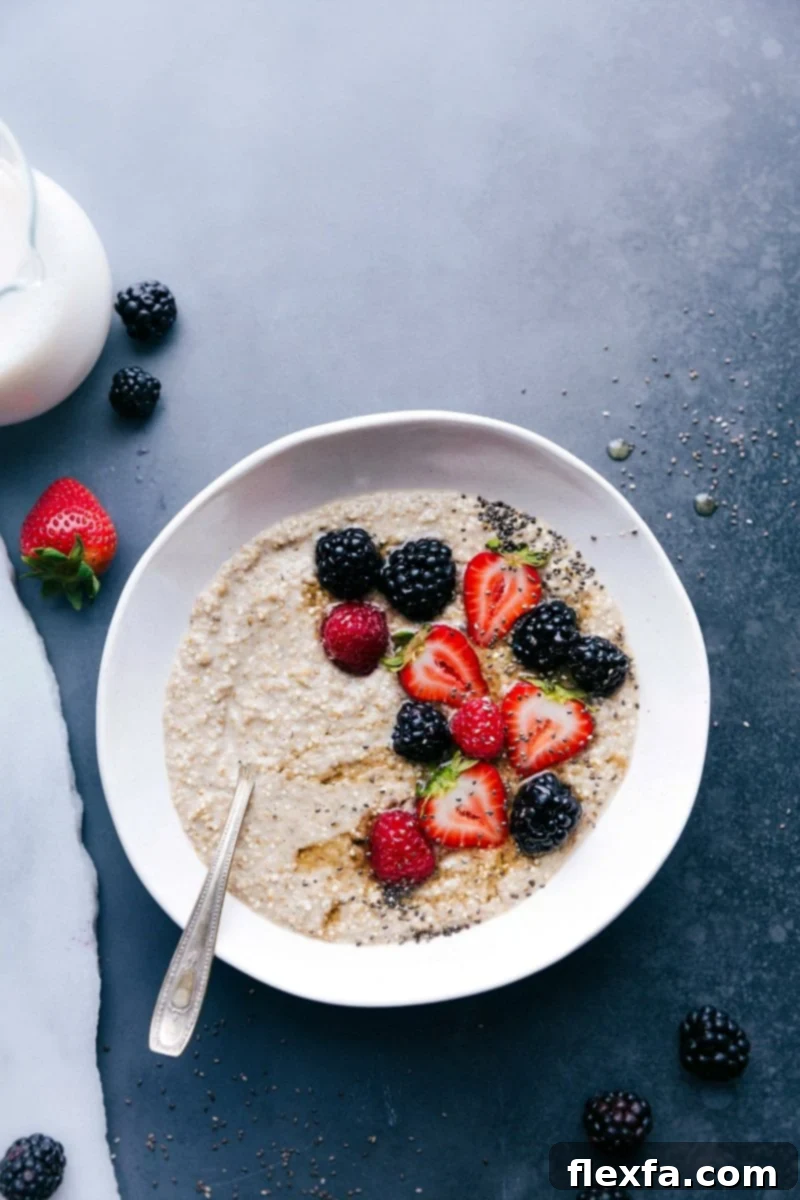 Warm Overnight Steel-Cut Oatmeal with Fresh Berries - A Perfect Breakfast Treat Delicious and warm overnight steel cut oatmeal topped with fresh berries, making a perfect breakfast dish.