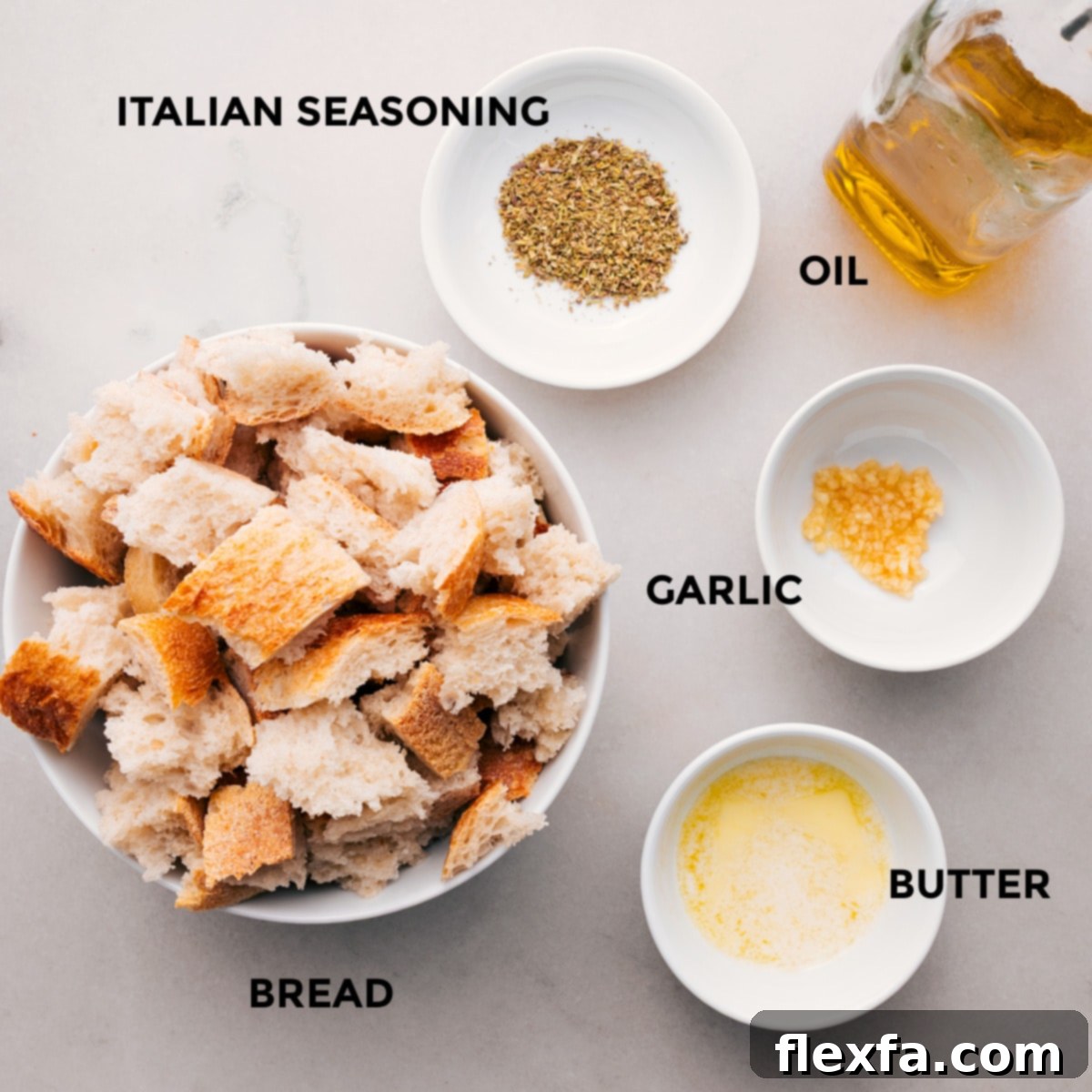 The bread is seasoned and roasted to add to the salad.
