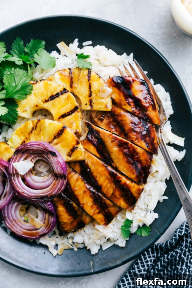 Teriyaki chicken over coconut rice.