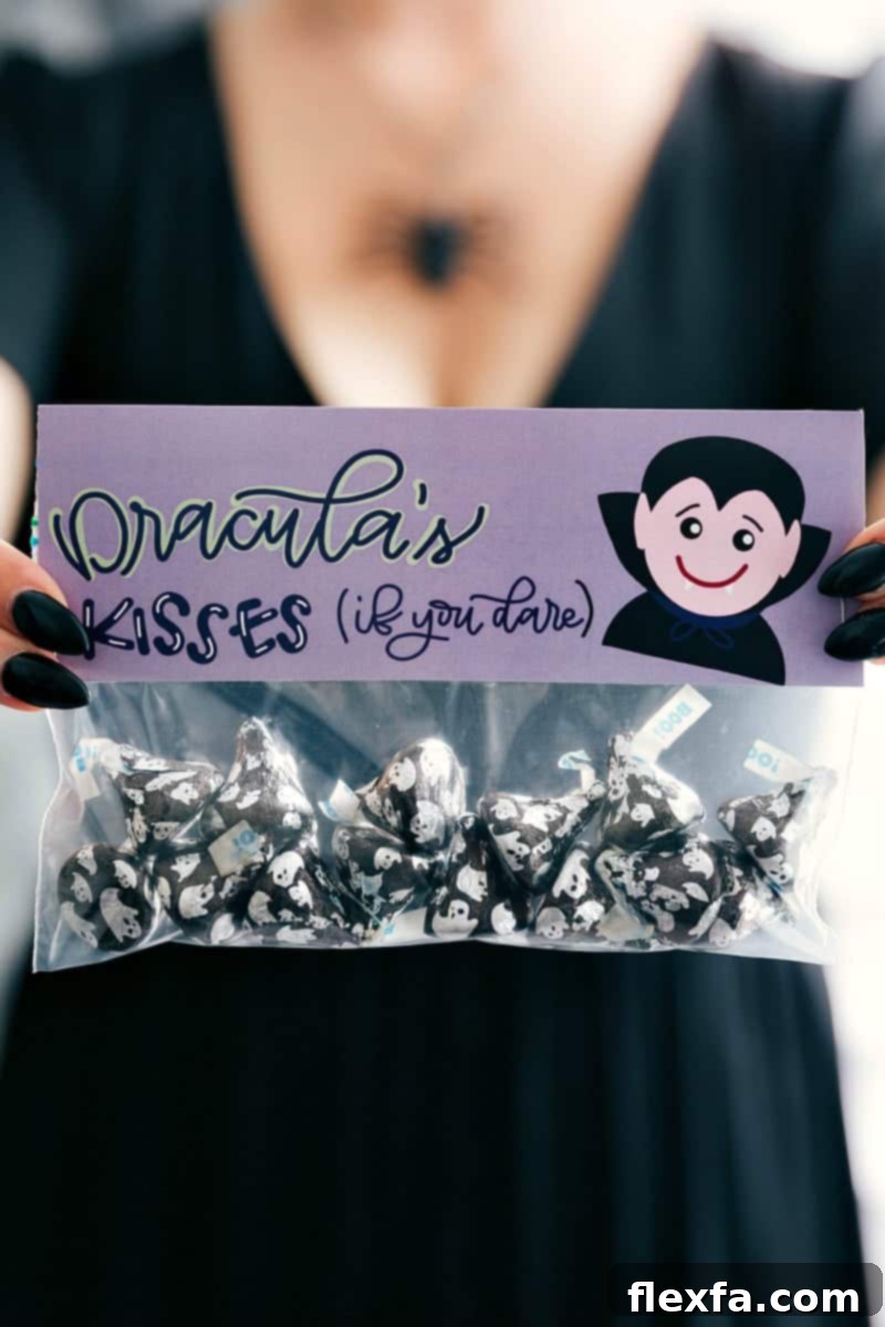 6 fun and festive easy Halloween bags filled with delicious treats! These candies/treats are put in a snack-size ziplock bag and you can staple on the FREE printable bag toppers! via chelseasmessyapron.com #halloween #gift #favor #party #dessert #candy #treat #easy #quick #free #printable #witch #pumpkin #dracula #zombie #mummy #ghost #skeleton #monster #zombies #kids #healthy #healthier #simple #fun #halloween #decor Dracula Kisses Halloween treat bag filled with festive Hershey's Kisses, adorned with a 'Dracula Kisses' printable topper.