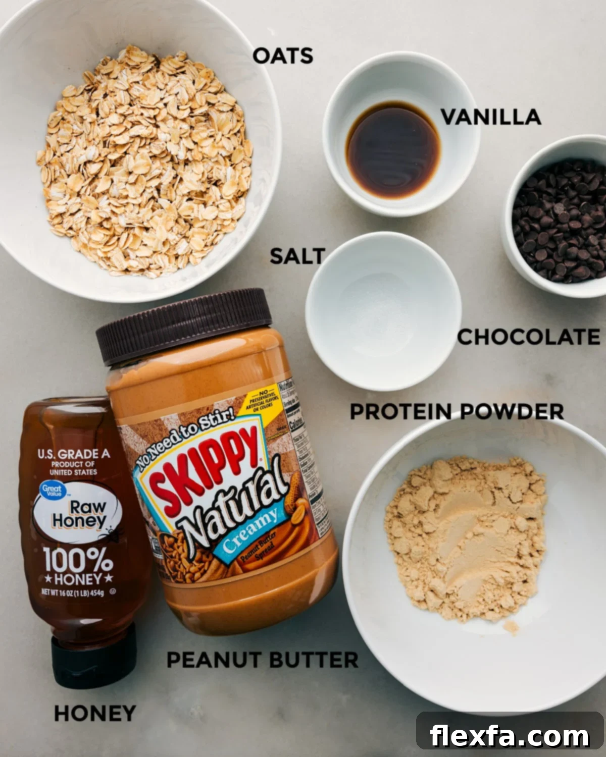 All the fresh and wholesome ingredients for these homemade protein bars laid out on a clean surface, ready for easy assembly.