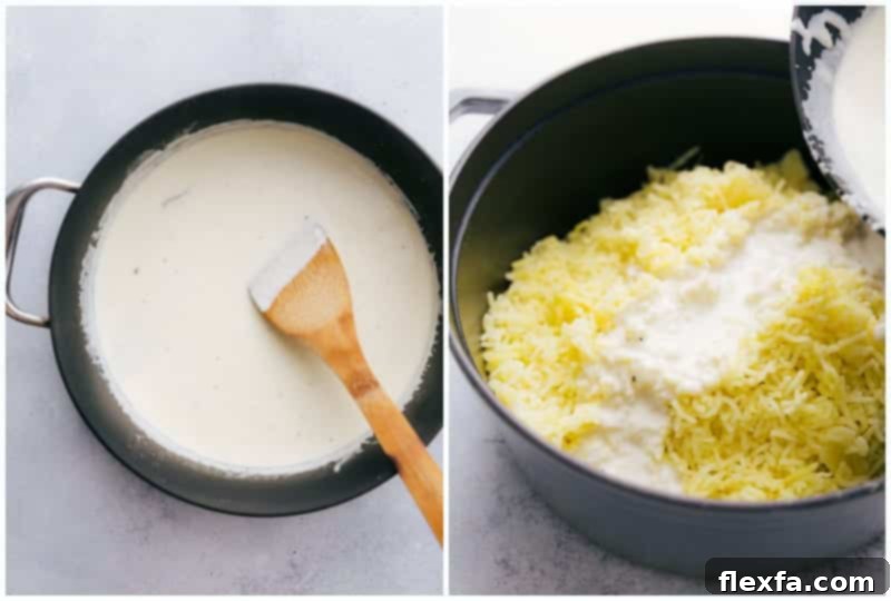 Smooth and creamy mashed potatoes being mixed with garlic-infused cream in a large pot.